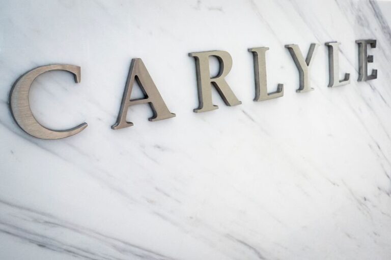 Carlyle will prepare bankers to sell British fund network Calastone, sources said