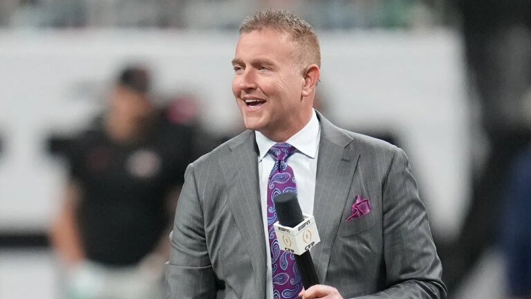 Kirk Herbstreit, an Ohio State football student, breaks down during the broadcast after the Buckeyes win the national title.